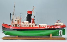 A superb 20th Century museum quality model steamboat of wood and metal construction having a