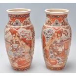 A pair of 19th century Japanese Satsuma vases. Each of baluster form with waisted necks and flared