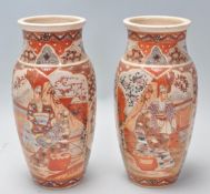 A pair of 19th century Japanese Satsuma vases. Each of baluster form with waisted necks and flared