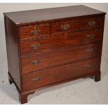 A 19th century George III mahogany bachelors chest of drawers. Raised on bracket feet with a bank of