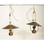 A pair of large and impressive brass ceiling lights of antique form having brass UFO saucer