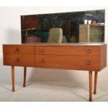 A retro mid century Danish influenced teak wood dressing table in the manner of Mogens Kolo.