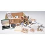 A mixed group of vintage and later costume jewellery to include gold tone brooches, boxed scottish