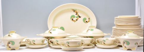 A 1930's Art Deco Royal Doulton ' Lynn ' pattern D5204  dinner service. The set comprising dinner