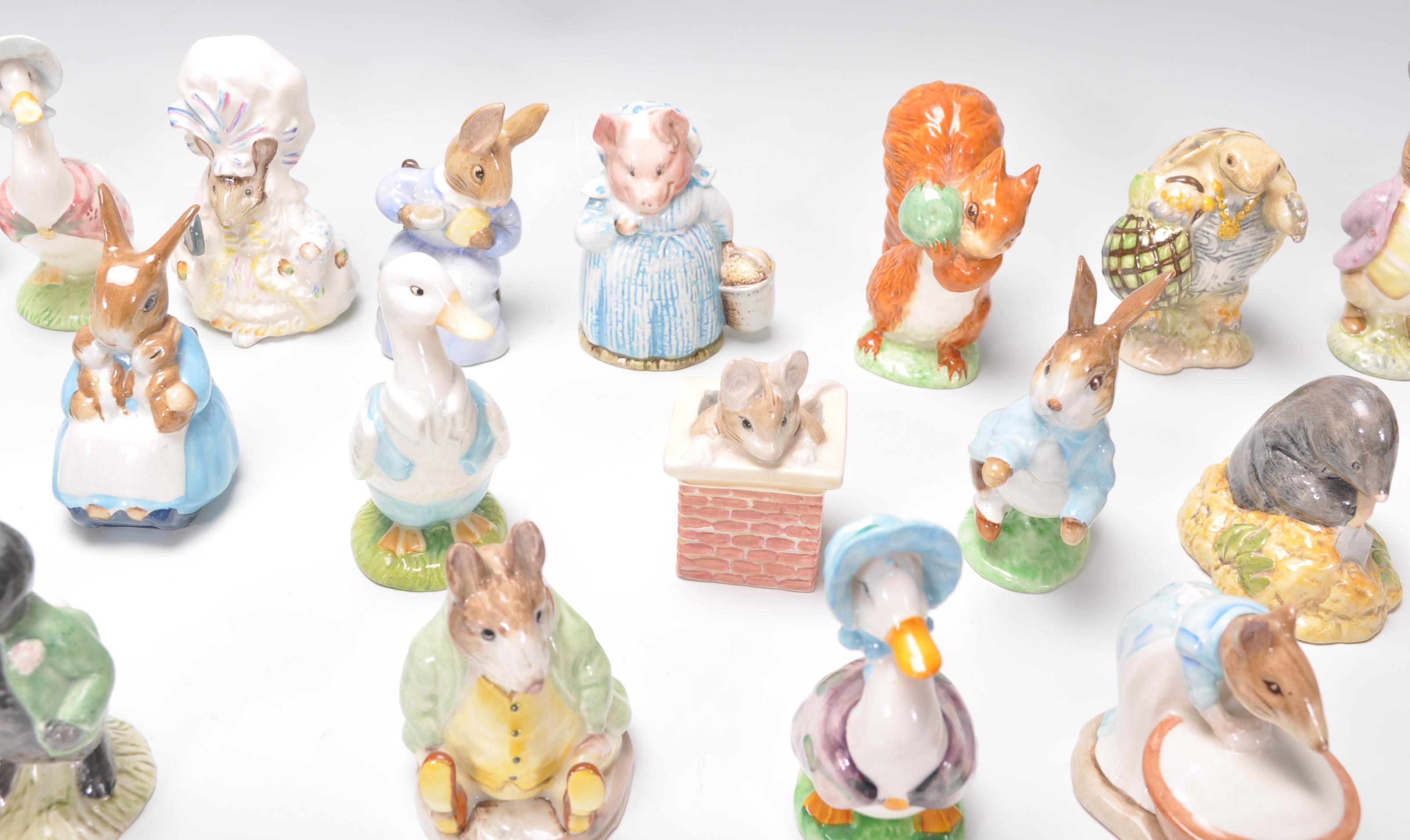 A collection of twenty five Beswick Beatrix Potter figurines to include Mrs Tiggy Winkle, Mr - Image 6 of 7