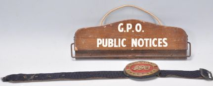 A 19th Century Victorian GPO Telegraph Messenger armband having applied brass lettering. Together