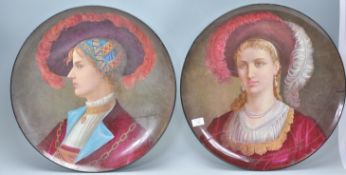 A pair of 19th Century French Parisian Montereau B & Cde 50 portrait plates / wall chargers having