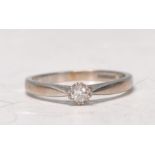 A 9ct white gold ladies single solitaire diamond ring of approx 0.10pts. Total weight 2.6g. Ring