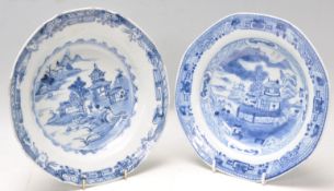 Two 19th Century porcelain Chinese blue and white plates of octagonal form each being hand painted