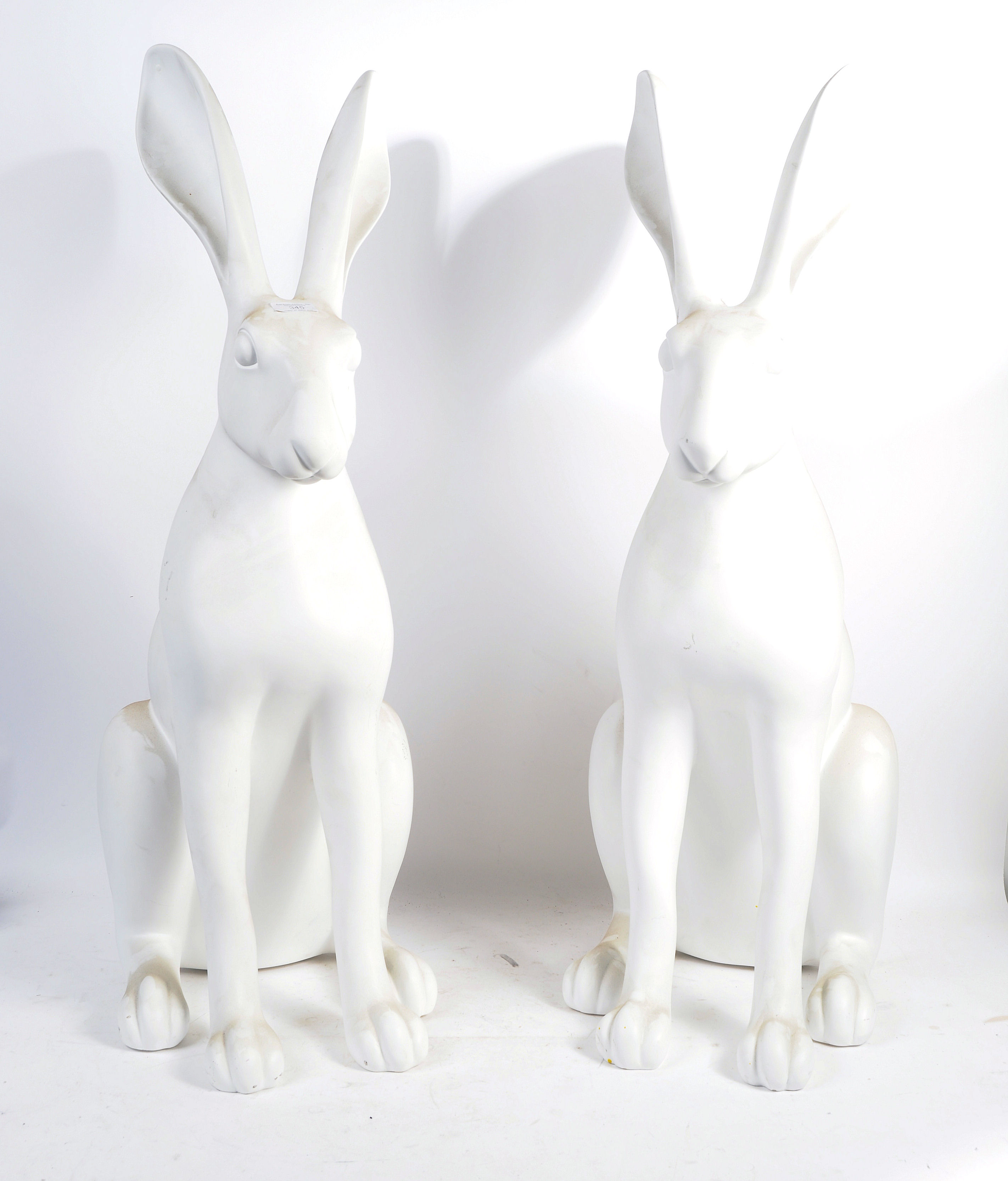 PAIR OF OVERSIZED PROMOTIONAL WHITE RABBIT STATUES