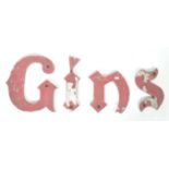 SET OF VINTAGE CAST METAL LETTERS READING GINS