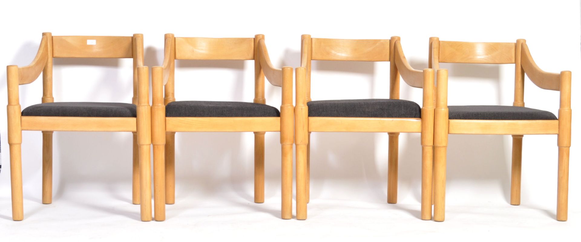 SET OF FOUR CARIMATE CARVER ARMCHAIRS BY VICO MAGISTRETTI