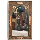 An unusual Moorish - Moroccan wall mirror having a