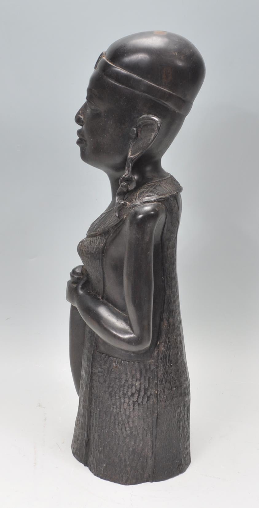 An African tribal carved ebony wood sculpture of a - Image 5 of 8