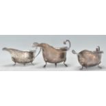A group of three silver hallmarked sauce boats of