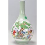 A contemporary Chinese bottle vase having a celado