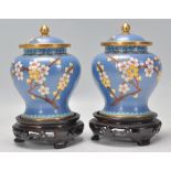 A pair of 20th Century Chinese cloisonne vases of