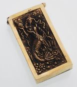 A brass vesta case decorated with a mermaid and va