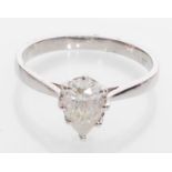 An 18ct white gold solitaire ring set with a teard