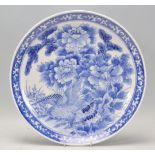 A 19th century Chinese blue and white charger plat