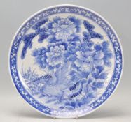 A 19th century Chinese blue and white charger plat