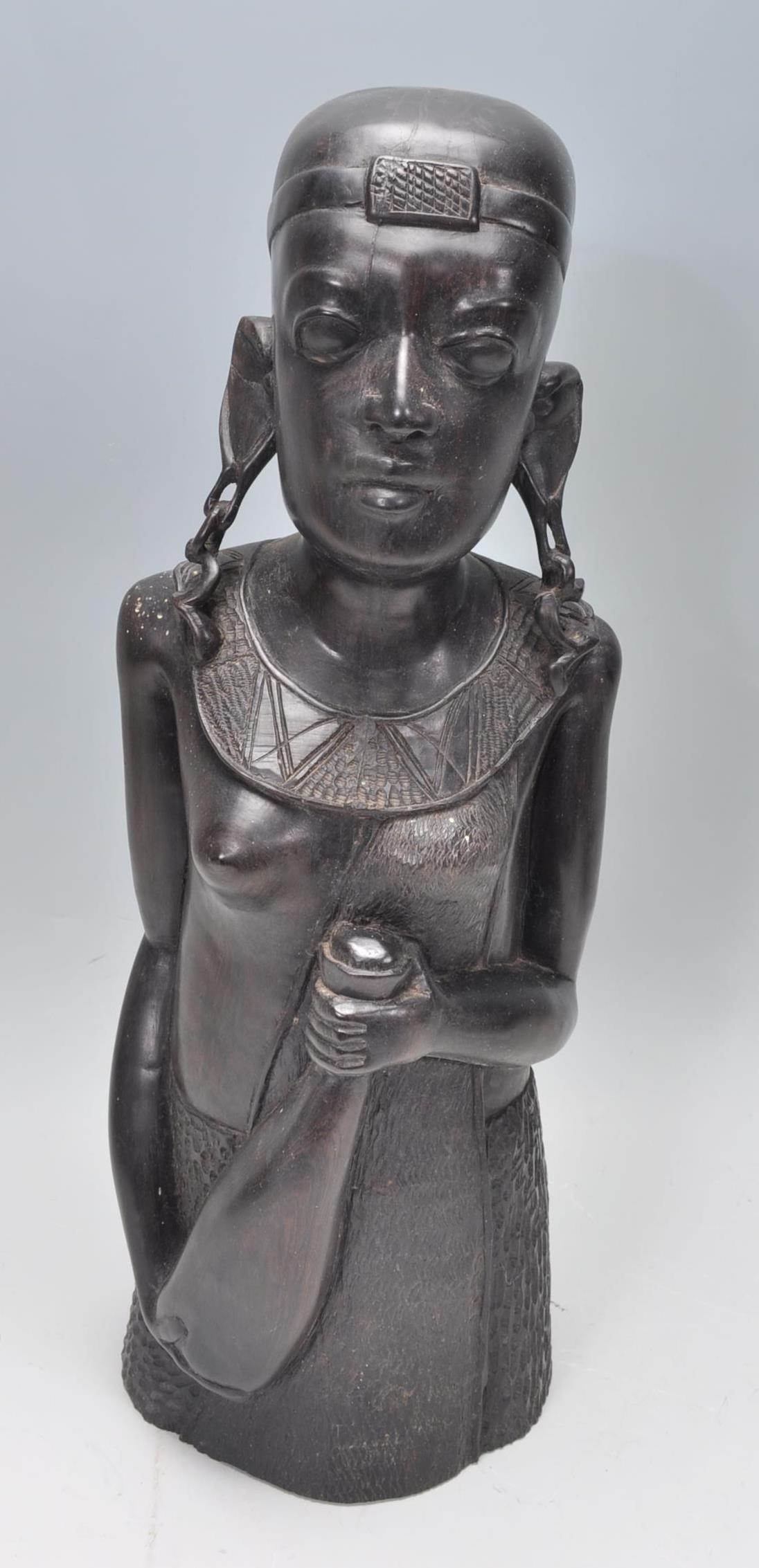 An African tribal carved ebony wood sculpture of a - Image 2 of 8