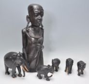 An African tribal carved ebony wood sculpture of a