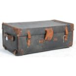A good vintage 20th leather travel trunk case having brown leather handles and straps. The cover