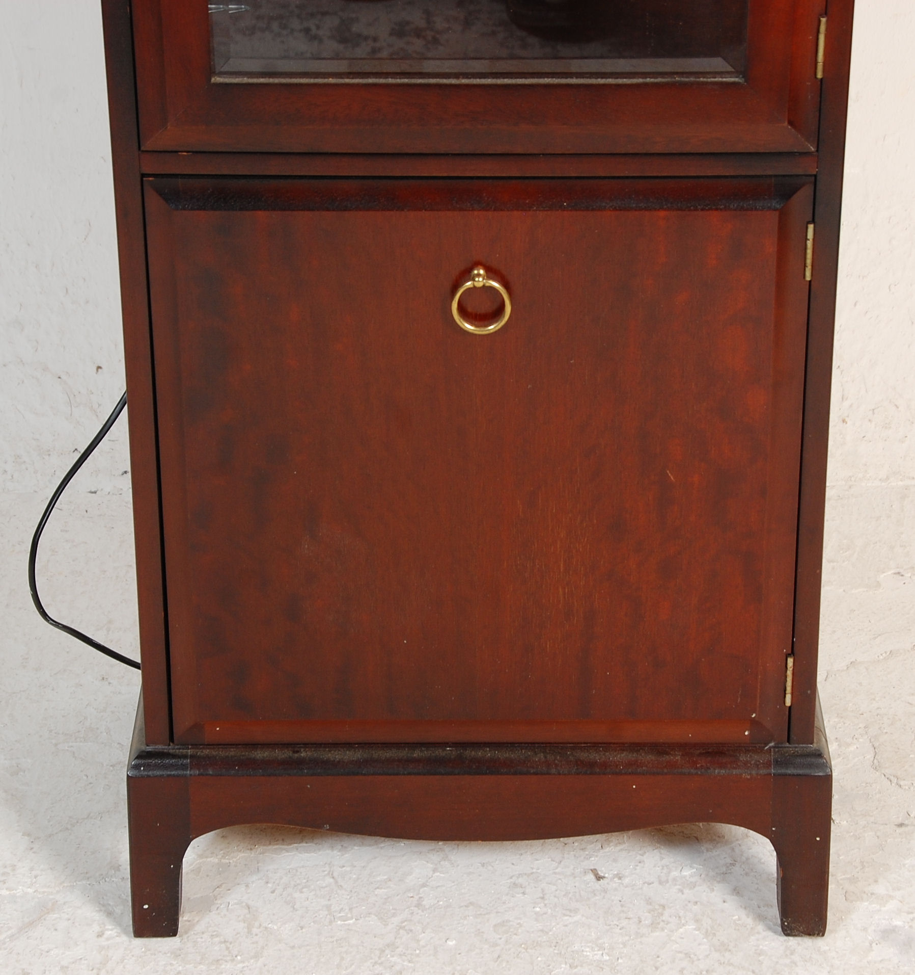 A 20th Century mahogany stag minstrel display cabinet having a cupboard base with ring handle to the - Image 3 of 5