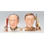 A pair of Royal Doulton Carry On series character jugs to include Sid James D7161 (limited edition