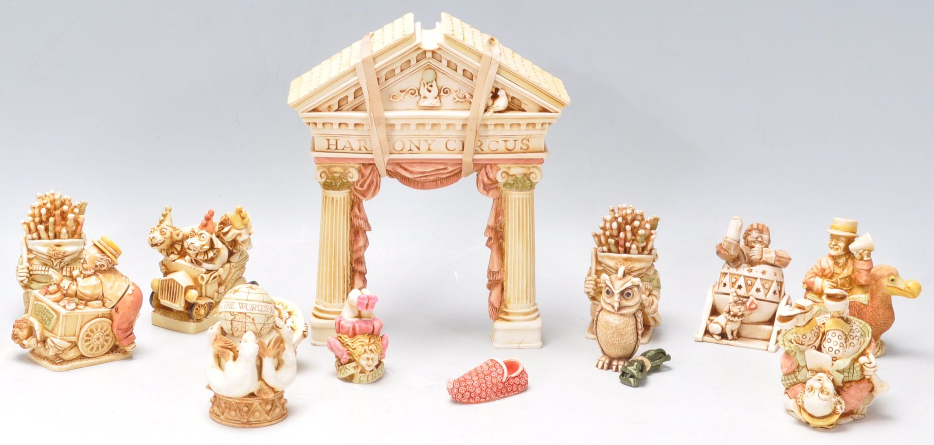 A collection of Harmony Kingdom resin circus theme figurines and ornaments to include a clown,