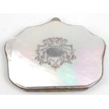 An early 20th Century mother of pearl cased ladies purse having applied silver decoration to the