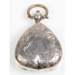 An early 20th Century Edwardian silver hallmarked heart shaped sovereign case with finely engraved