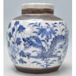 A 19th Century Chinese lidded blue and white crackle glaze ginger jar having hand painted blue and