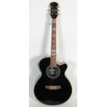 A good Lindo 'Black Fire' model acoustic and electric six string guitar having a black body with