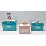 A group of three Walt Disney ceramic figures to include Olszewski Disney Snow White And The Seven