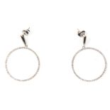 A pair of 14ct white gold drop hoop earrings being set with round cut diamonds. Weight 4.2g. Measure
