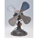 A late Victorian / early 20th Century industrial black metal desk fan by S . Universal 2201505.