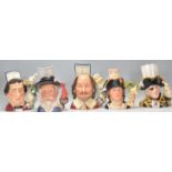 A group of five Royal Doulton ceramic character jugs to include Lewis Carroll D7096, Sir Walter