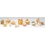 A group of thirteen Harmony Kingdom resin novelty animal figurines to include an owl box, polar