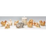 A collection of eleven Harmony Kingdom resin novelty figurines / boxes to include three cockerel