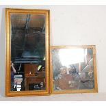 Two large vintage 20th Century wall mirrors to include a square mirror within a wooden frame and a