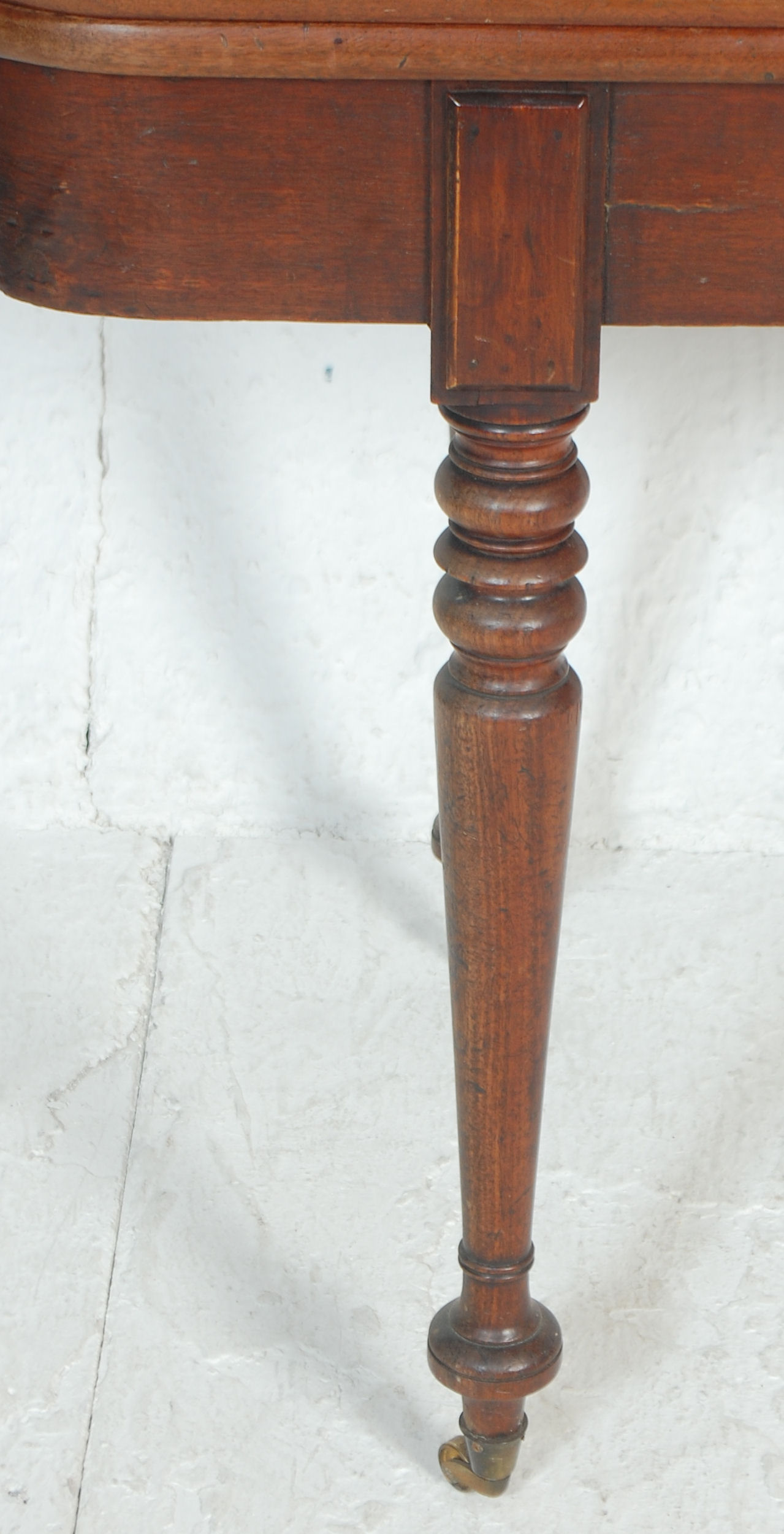 A 19th Century mahogany card / tea table having a folding and revolving top with brass fittings - Image 3 of 7