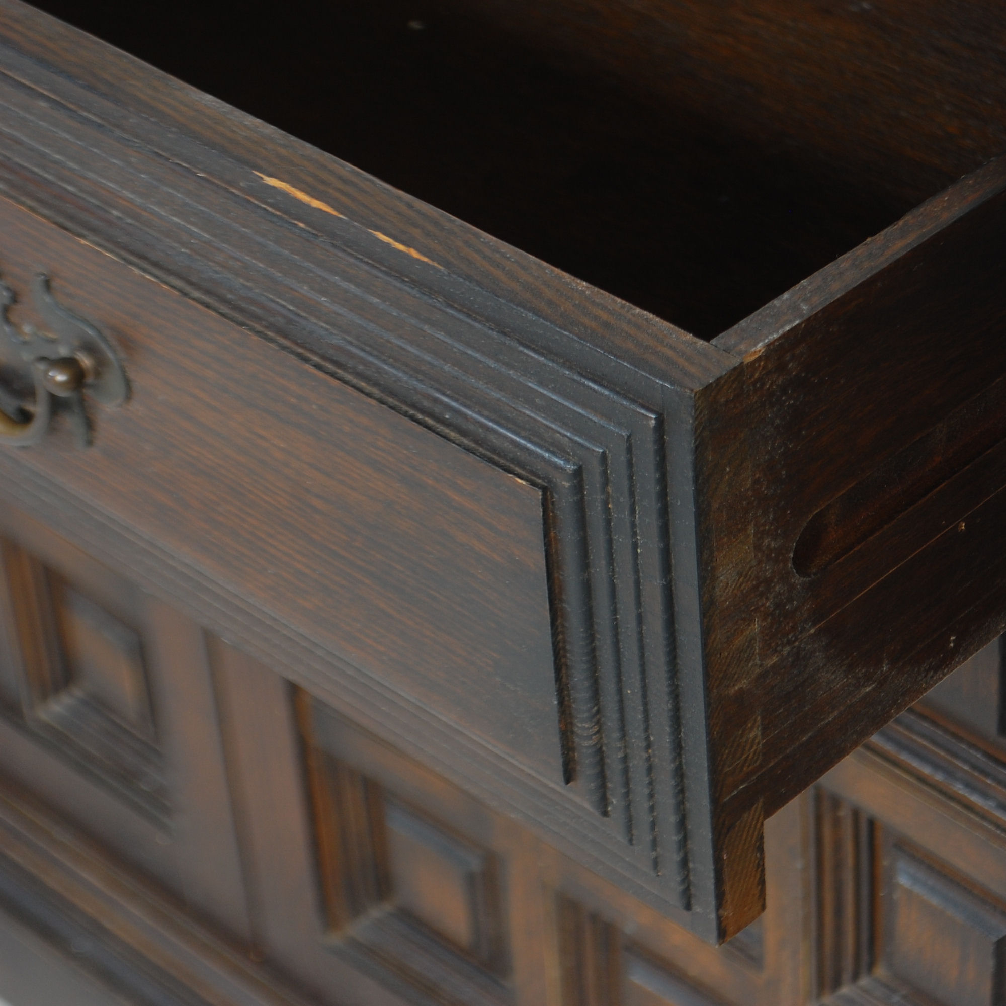 A mid century Spanish influence large carved oak sideboard / dresser base with portcullis relief - Image 4 of 9