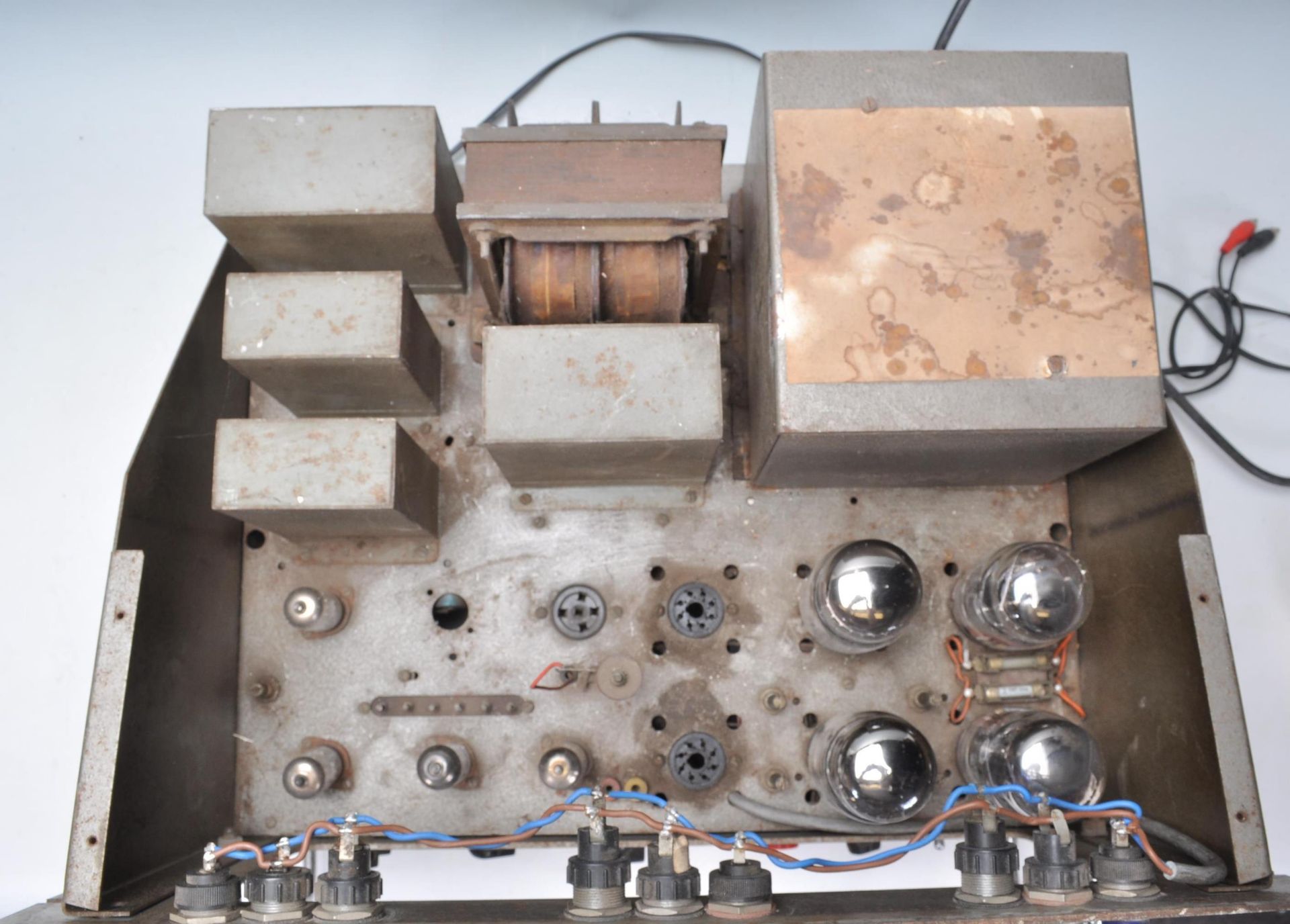 A vintage mid 20th Century valve amplifier having four original KT88 valves marked 8250Z. - Image 6 of 9