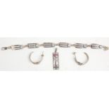 A mixed group of silver Art Nouveau style jewellery in the manor of Rennie Mackintosh to include a