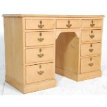 A 20th century pine twin pedestal desk. Raised on plinth base with a series of short drawers