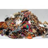 A large collection of vintage and later costume jewellery to include multiple necklace with gold and
