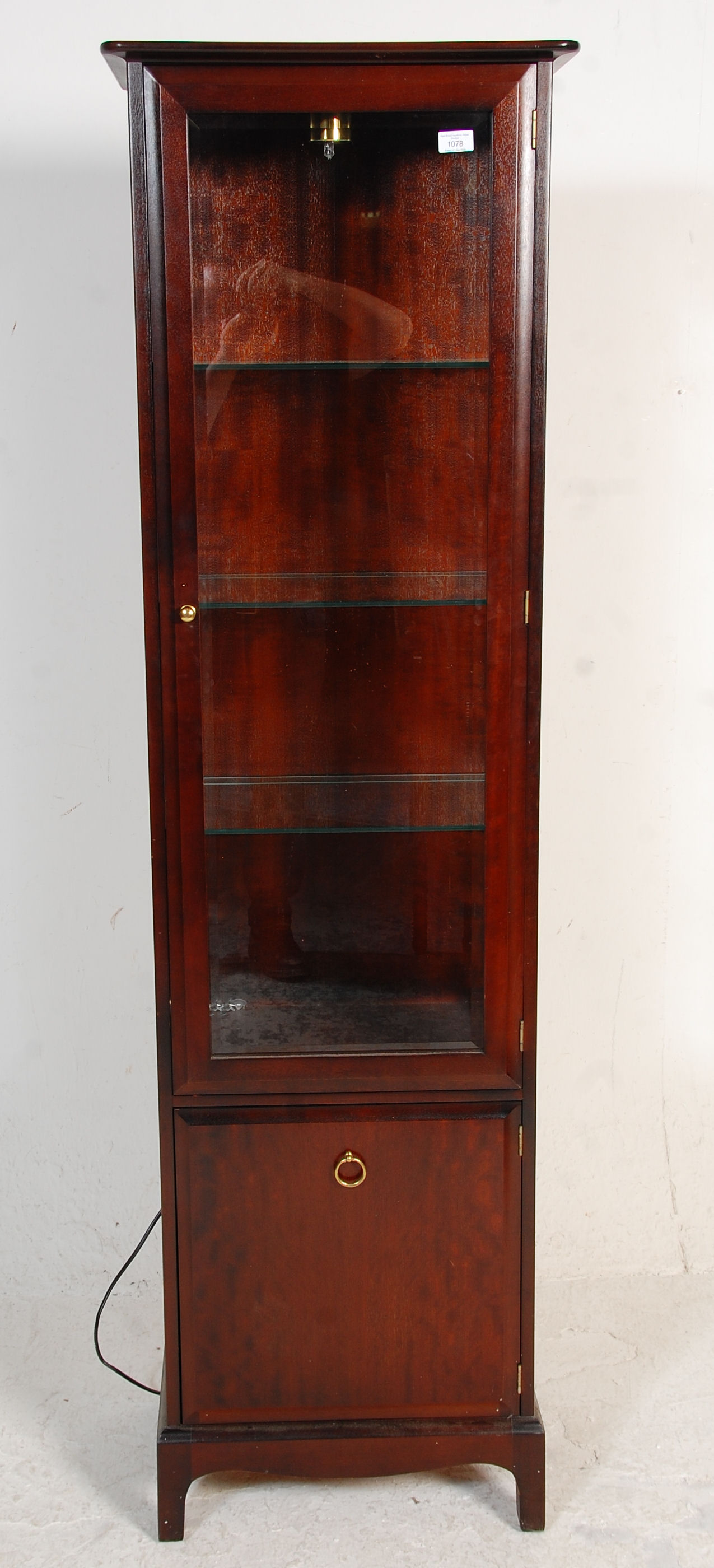 A 20th Century mahogany stag minstrel display cabinet having a cupboard base with ring handle to the - Image 2 of 5