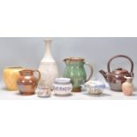 A collection of vintage retro 20th Century studio pottery to include a Buckfast Abbey ceramics green